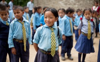 Sanju Rai, 9, during the morning assembly in the school in Nepal