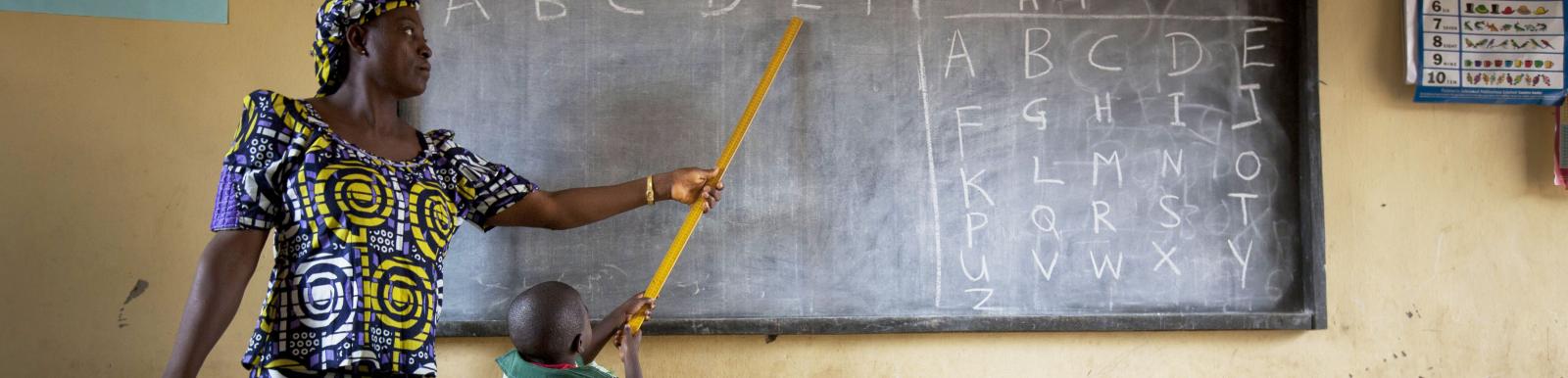 Ladi T. Danlami with schoolchildren in Yangoji Primary School where she is a teacher, Abuja State, Nigeria on the 4th October, 2012. 