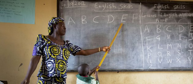 Ladi T. Danlami with schoolchildren in Yangoji Primary School where she is a teacher, Abuja State, Nigeria on the 4th October, 2012.