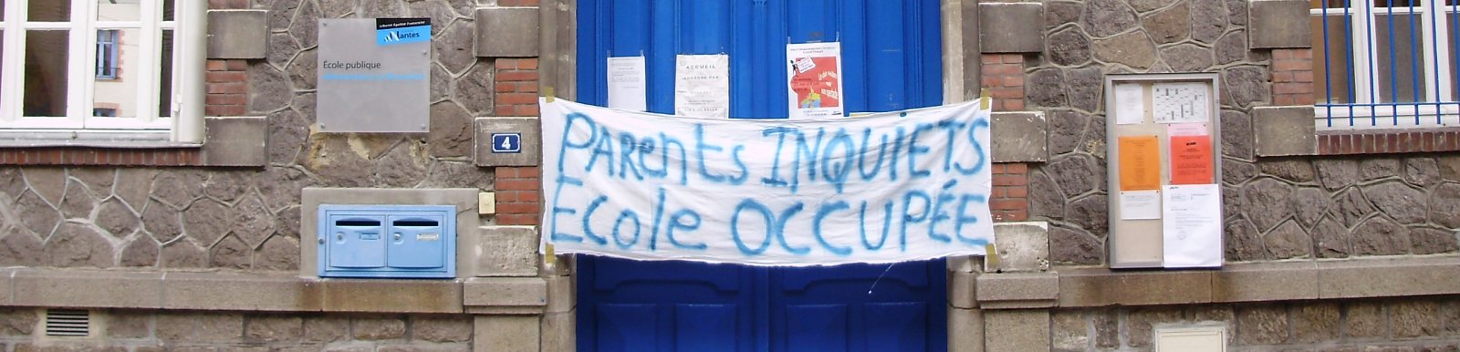 "Parents worried. School occupied" "Parents worried. School occupied"